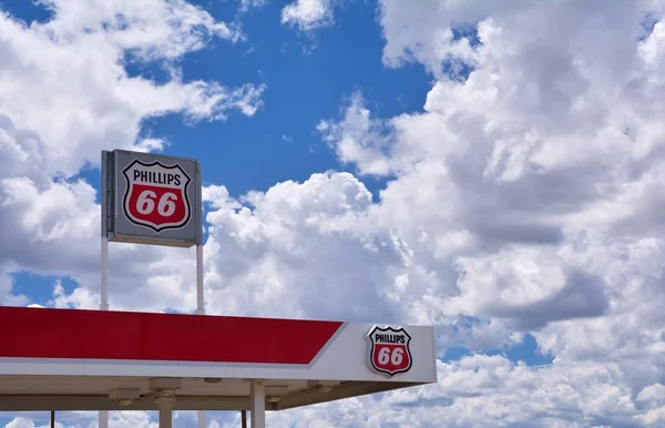 depositphotos_169663772-stock-photo-phillips-66-gas-station-sign